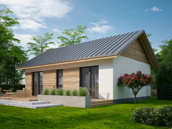 Ekologiczny dom z panelami słonecznymi i zielonym dachem